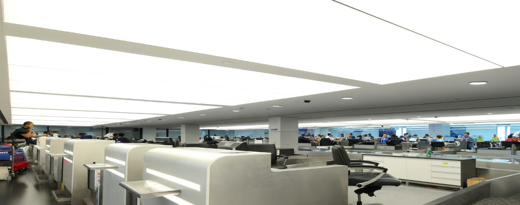 Stretch ceiling lighting for large open interiors – modern illuminated ceiling for commercial spaces