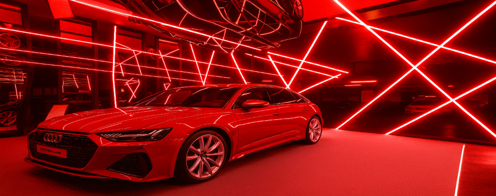 Glossy black stretch ceiling with red LED lighting – luxury showroom ceiling above sports car