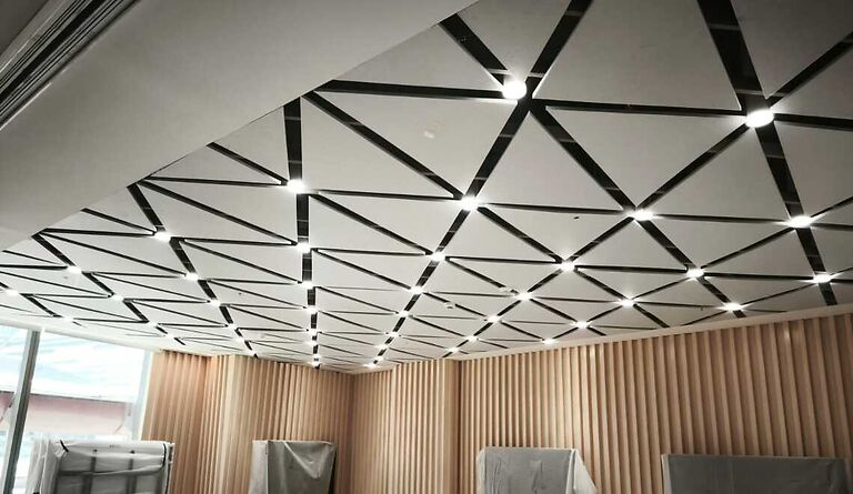 Geometric Ceiling Design with Diagonal Squares Wood Wool Acoustic Panels for Soundproofing
