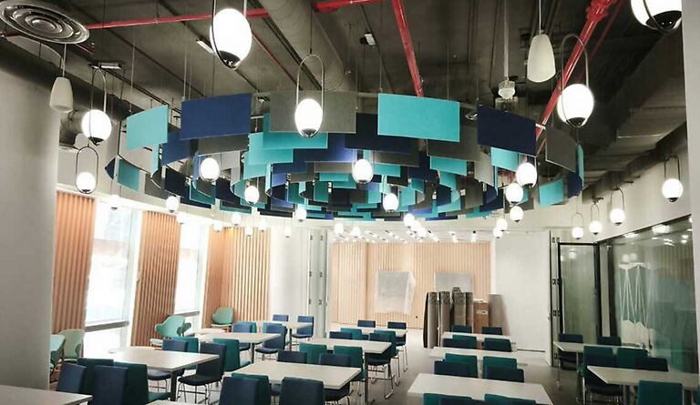 Modern Ceiling with Diagonal Squares Wood Wool Acoustic Panels and Stylish Lighting